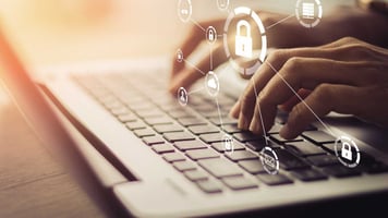Typing on keyboard and confidential sign