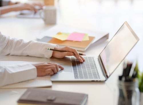 businessman-working-laptop-pencil