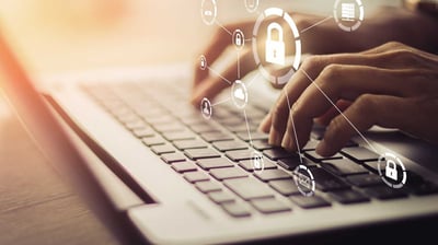 Typing on keyboard and confidential sign Typing on keyboard and confidential sign
