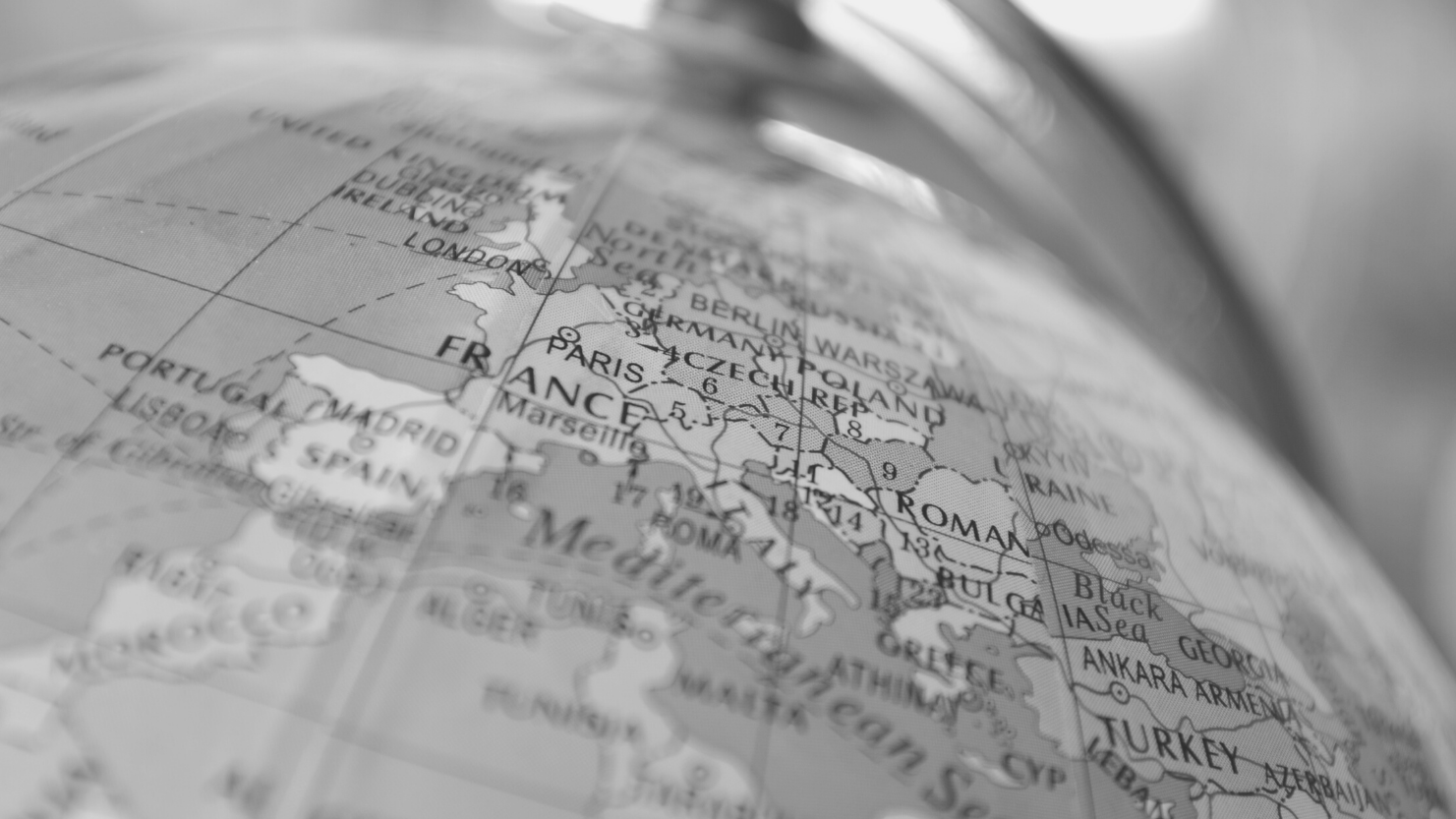 black and white image of globe showing Europe
