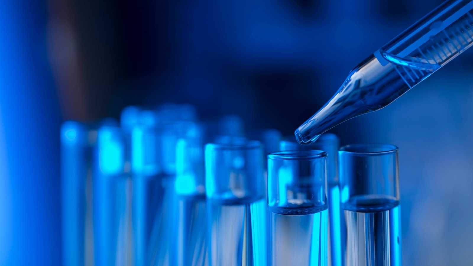 Blue chemical substances with pipette